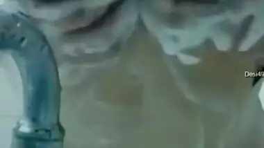 Indian girl always takes a camera when she goes to take a shower