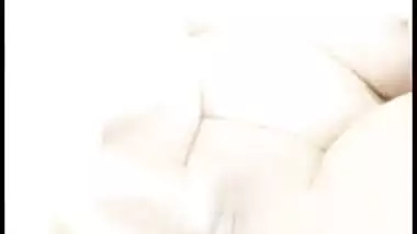 Nude Desi babe licks sweet lollipop and sticks it into her XXX twat