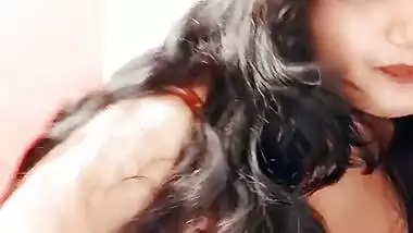 Indian Bhabhi toying with her big boobs on cam