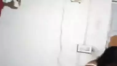 Dude makes amateur XXX video of Desi chick putting her clothes on