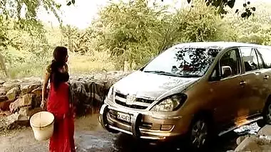 Indian bhabhi outdoor car wash & displaying deep cleavage